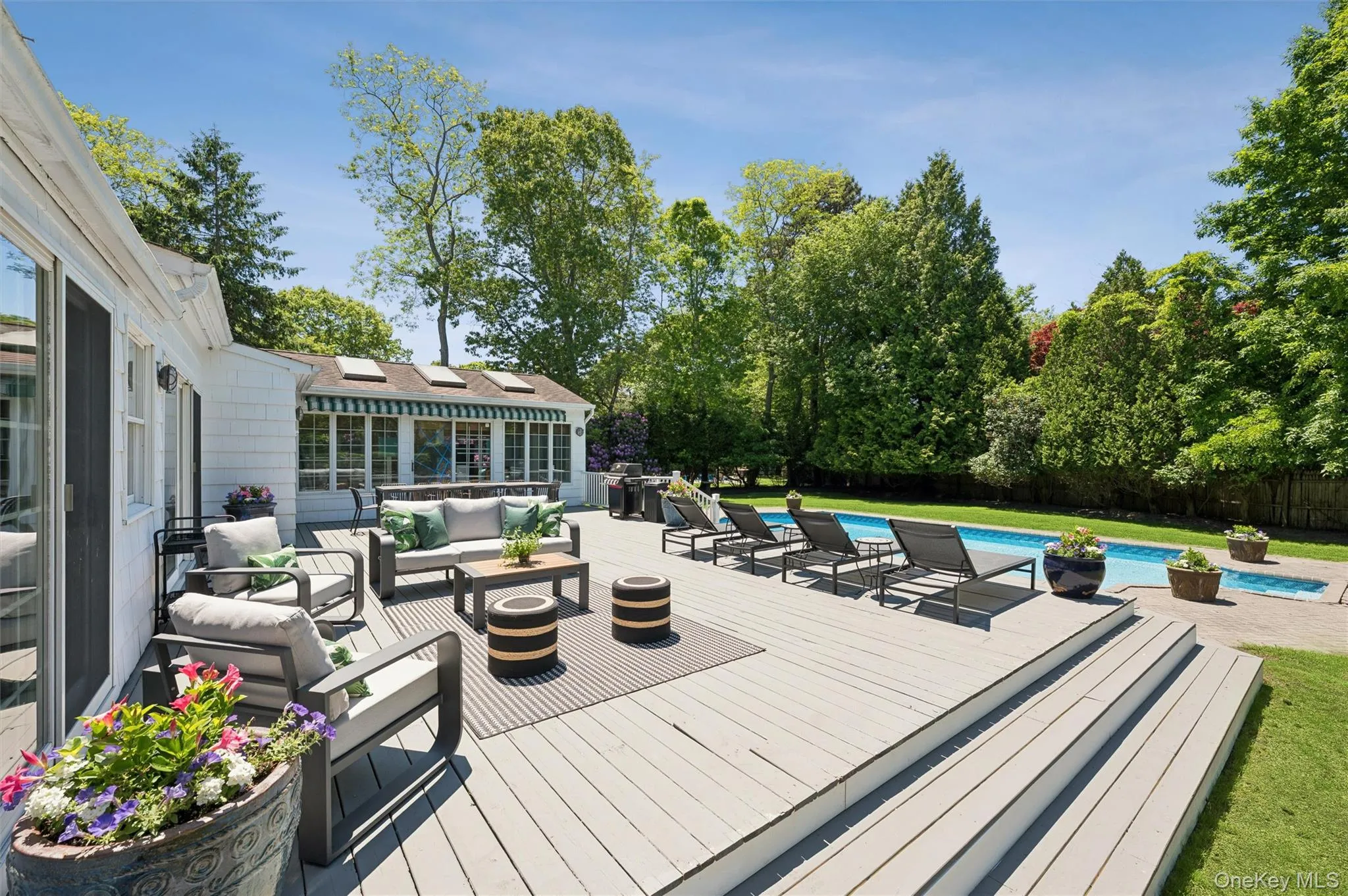Spacious deck with heated pool Spacious deck with heated pool