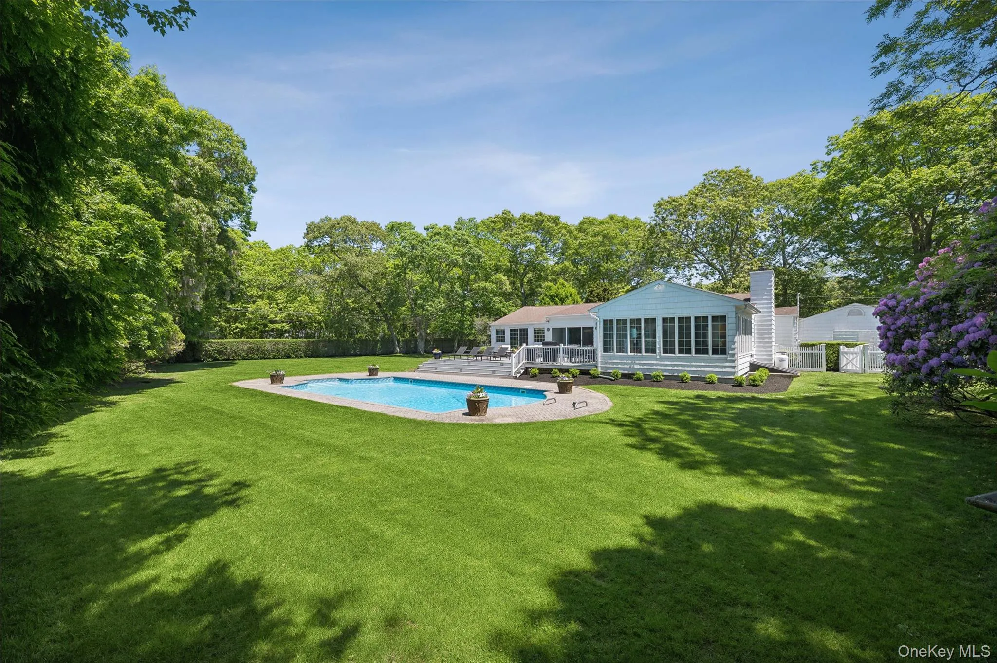 Expansive yard around pool Expansive yard around pool