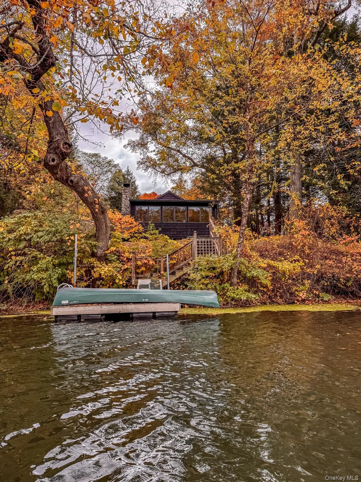 Dock with a water view and a gazebo Dock with a water view and a gazebo