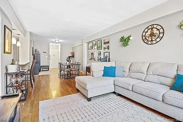 Living room with light wood-type flooring Living room with light wood-type flooring