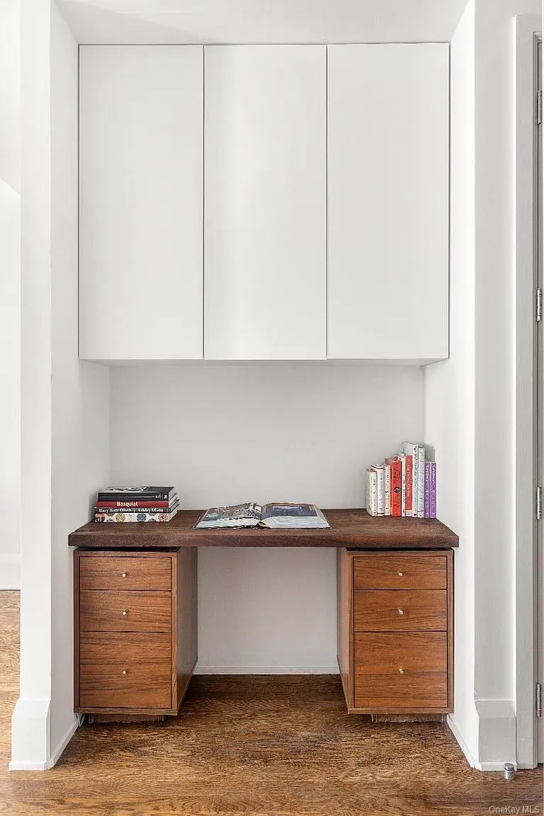 Detailed view of wood finished floors and an office area Detailed view of wood finished floors and an office area