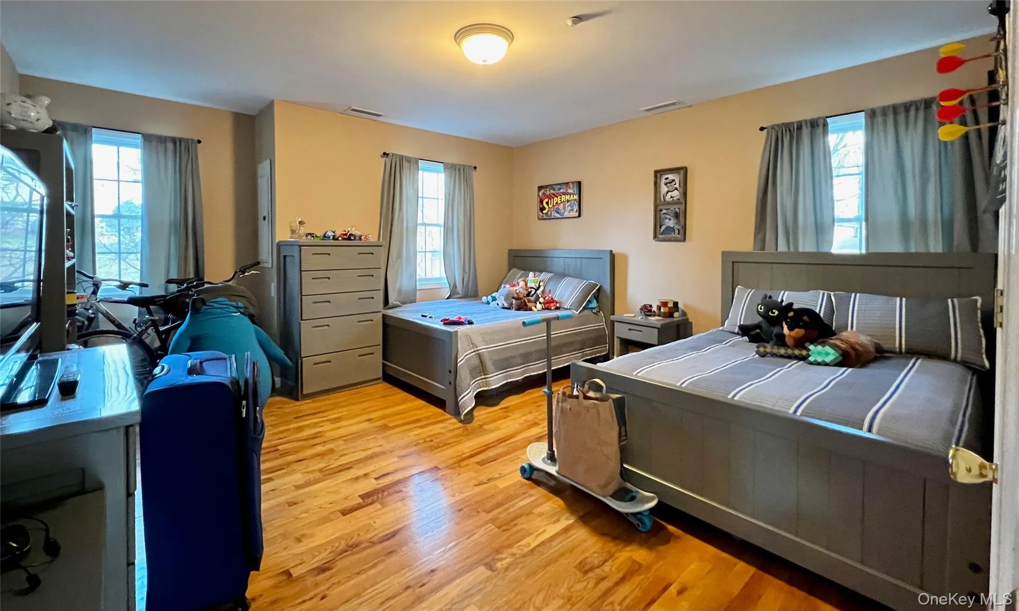 Bedroom featuring light wood-style flooring Bedroom featuring light wood-style flooring