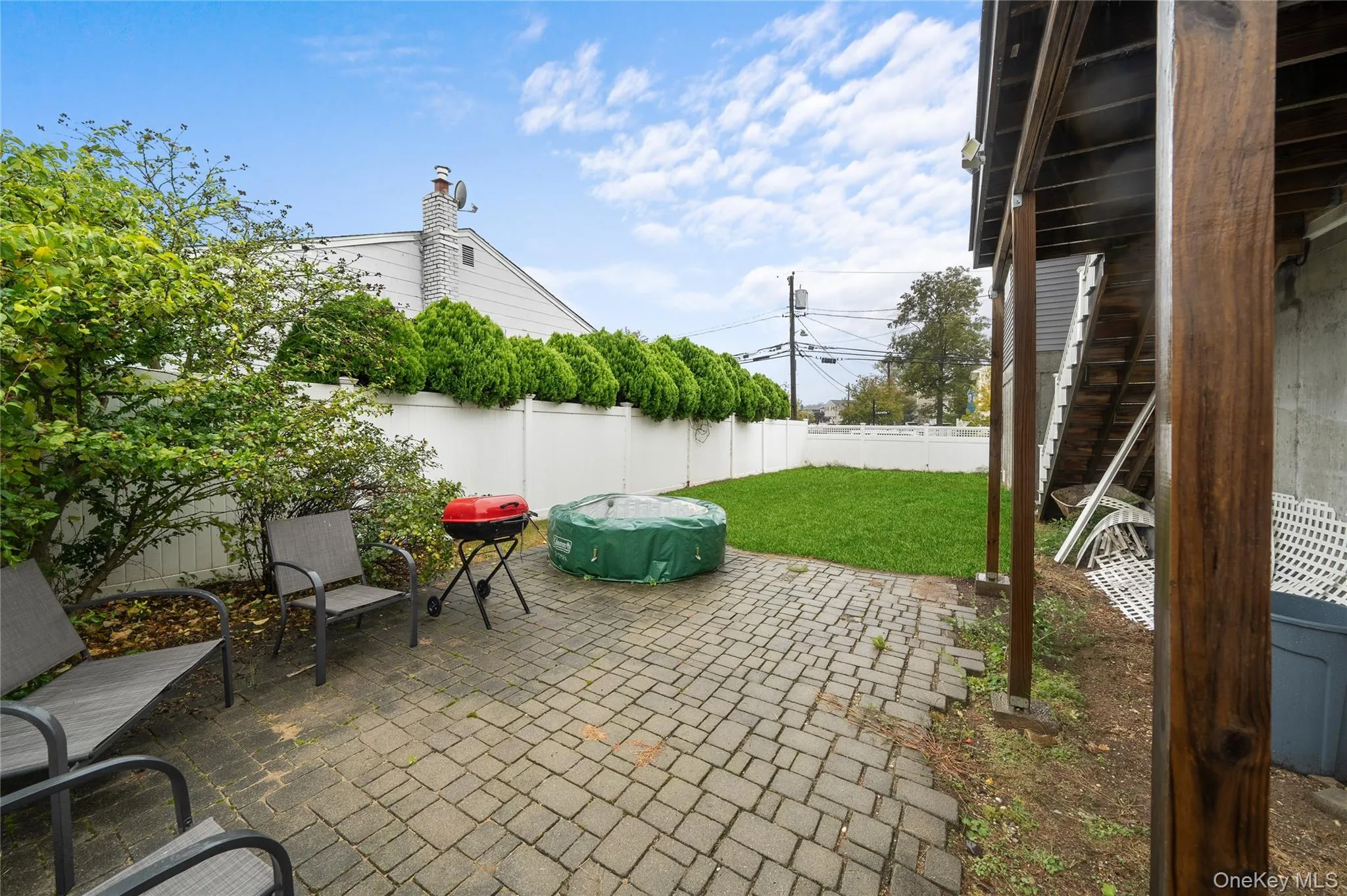 Fenced backyard featuring a patio Fenced backyard featuring a patio