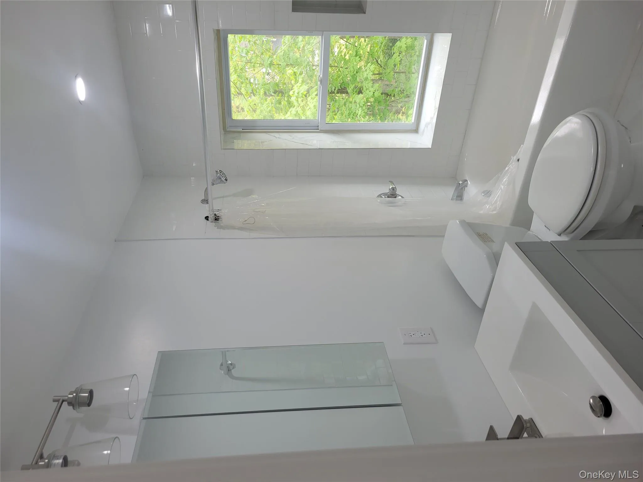 Full bath with vanity and shower / washtub combination Full bath with vanity and shower / washtub combination