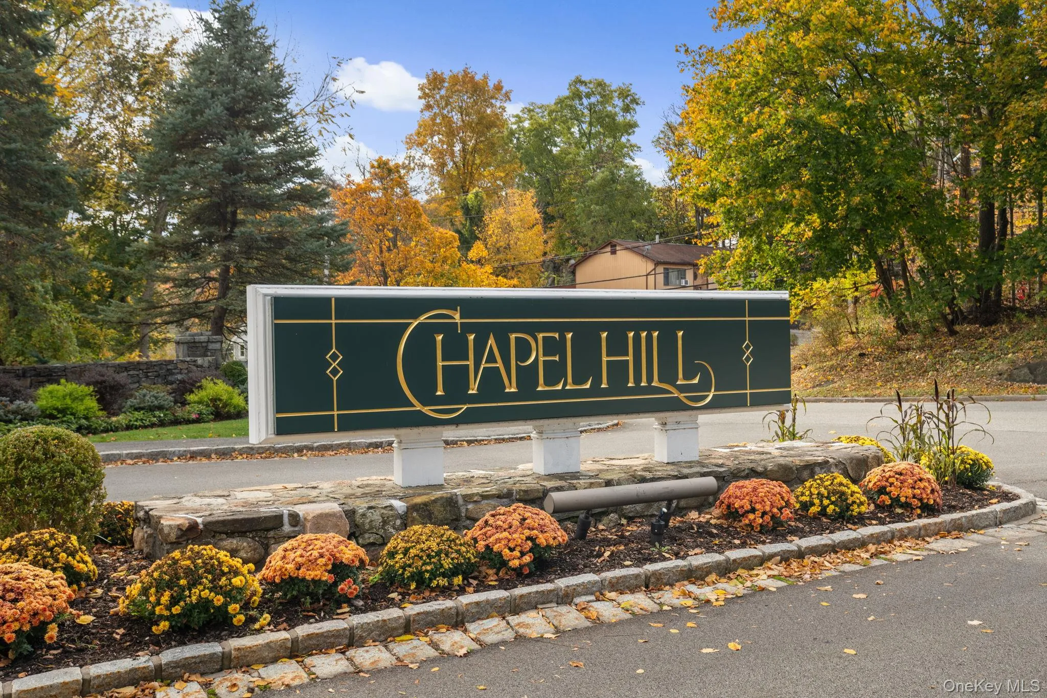 The grand Chapel Hill entrance sign stands proudly amid lush landscaping and vibrant seasonal blooms, offering a warm welcome home. The grand Chapel Hill entrance sign stands proudly amid lush landscaping and vibrant seasonal blooms, offering a warm welcome home.