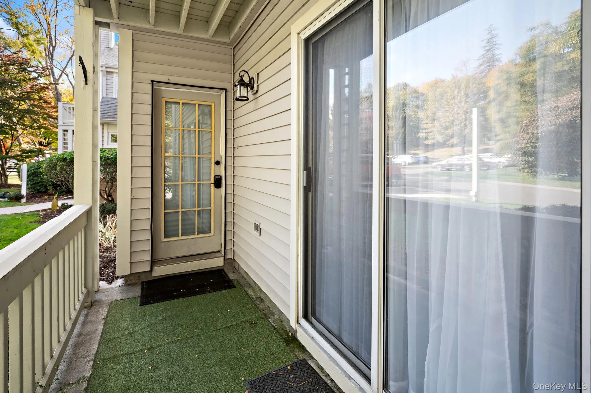 The private covered patio offers a peaceful outdoor retreat with convenient access directly into the home for easy everyday living. The private covered patio offers a peaceful outdoor retreat with convenient access directly into the home for easy everyday living.