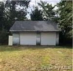 View of 2-car detached garage in rear of residence