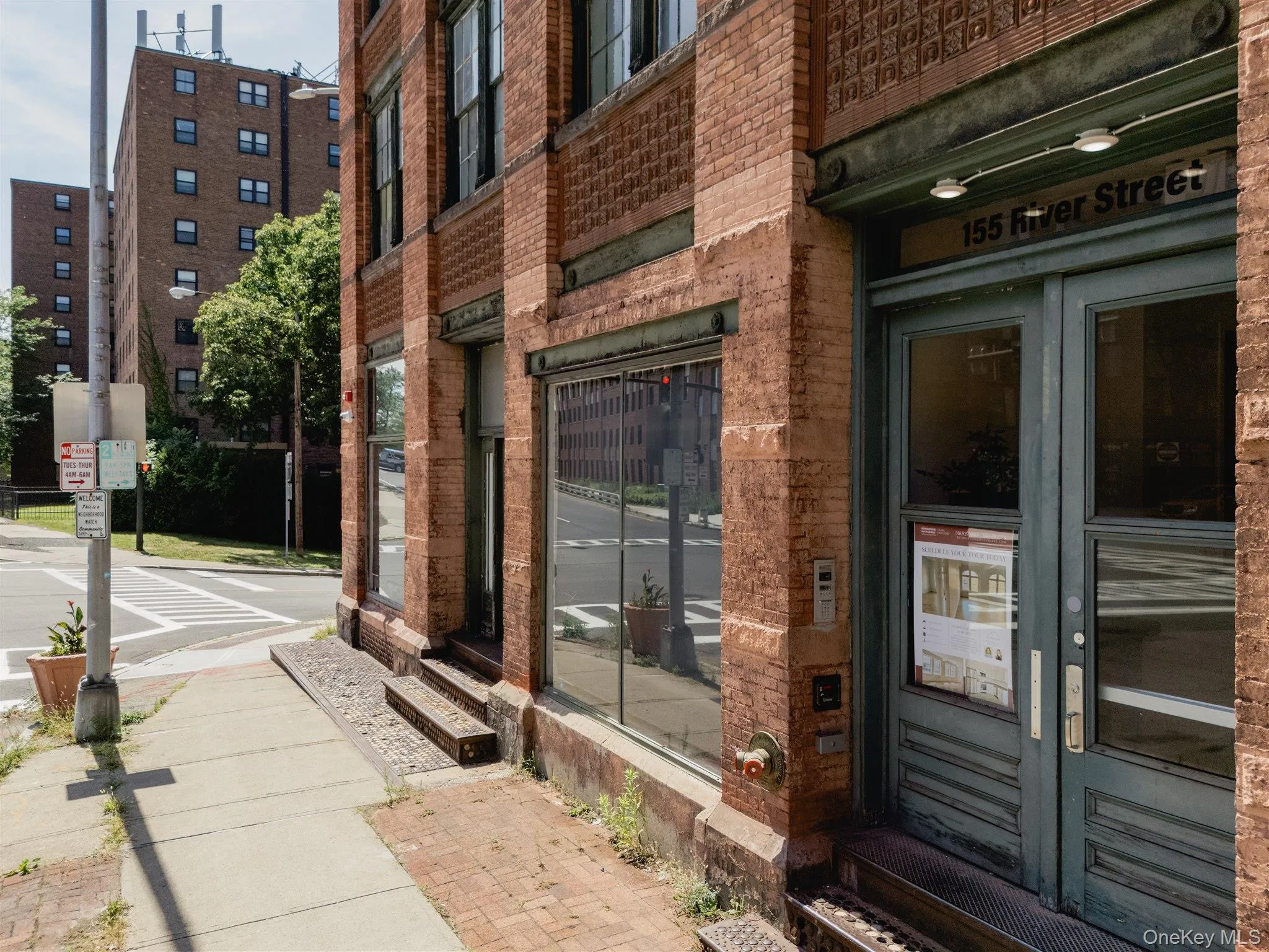 Entrance to property with brick siding and french doors Entrance to property with brick siding and french doors