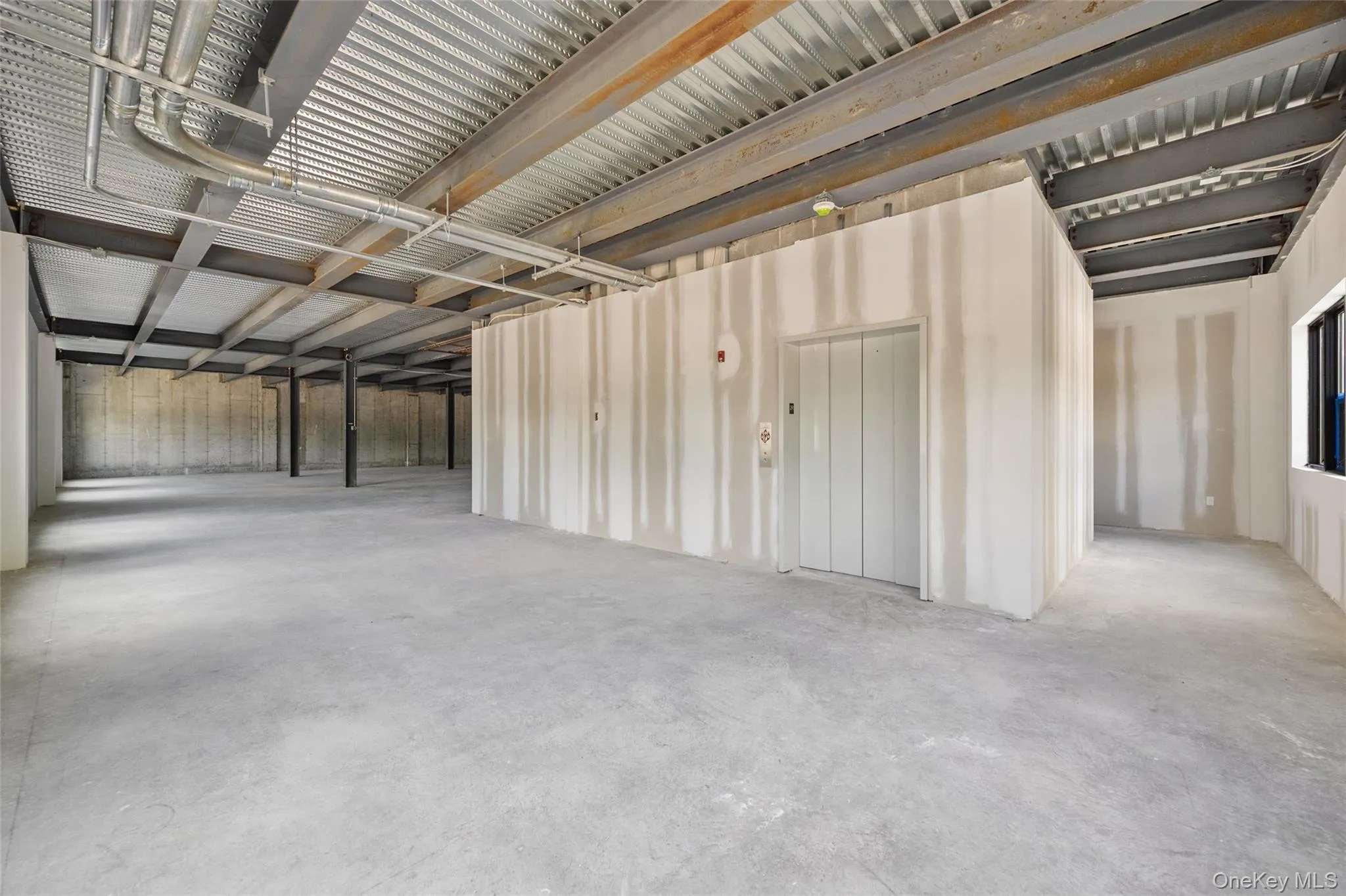 Garage featuring elevator Garage featuring elevator