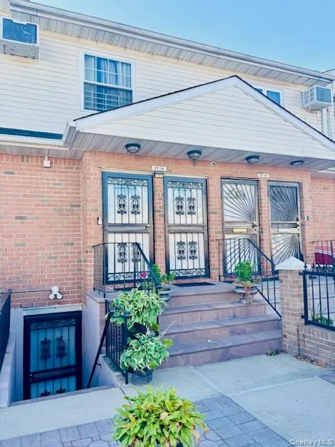 Doorway to property with brick siding Doorway to property with brick siding