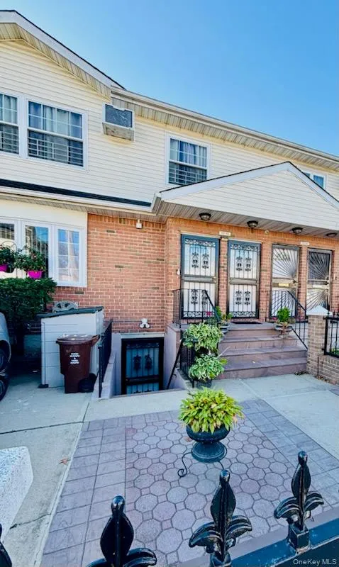 Back of house with brick siding Back of house with brick siding