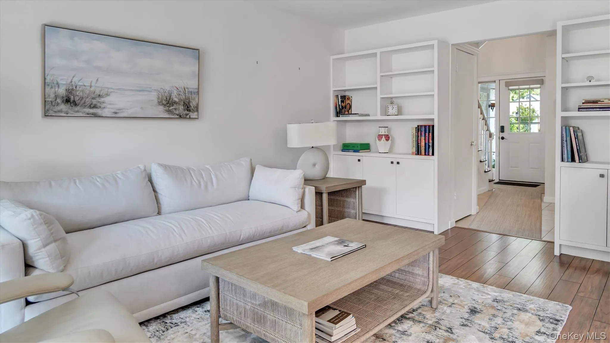Living room with light wood-style flooring Living room with light wood-style flooring