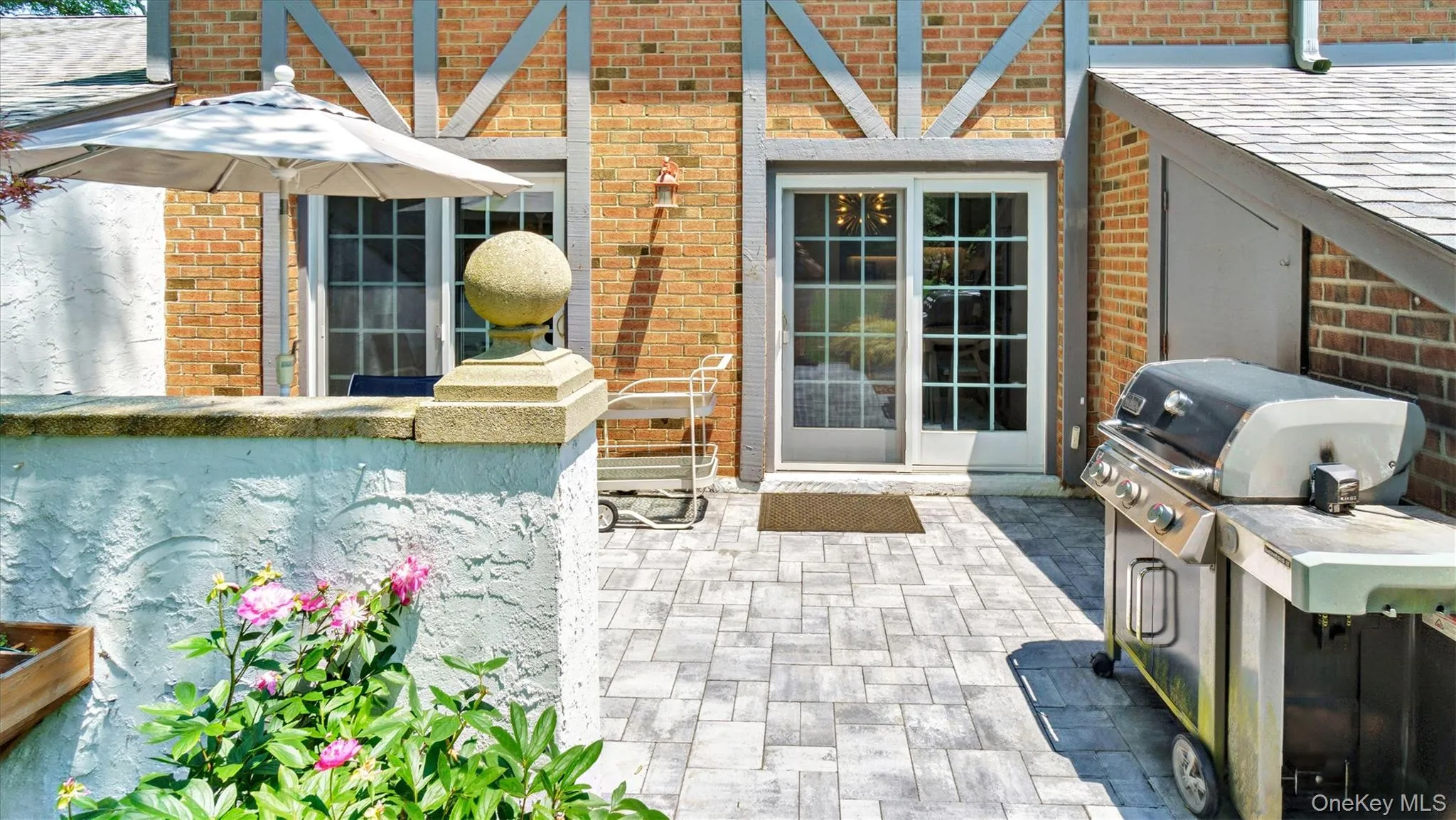 View of patio featuring grilling area View of patio featuring grilling area