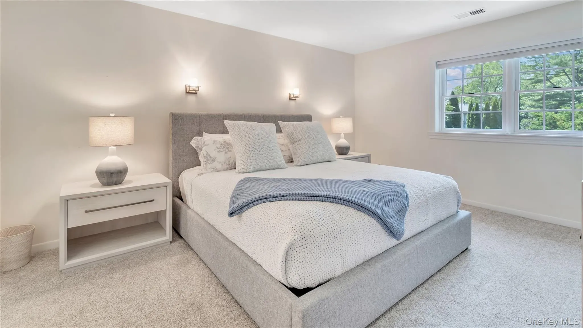 Primary bedroom featuring baseboards Primary bedroom featuring baseboards