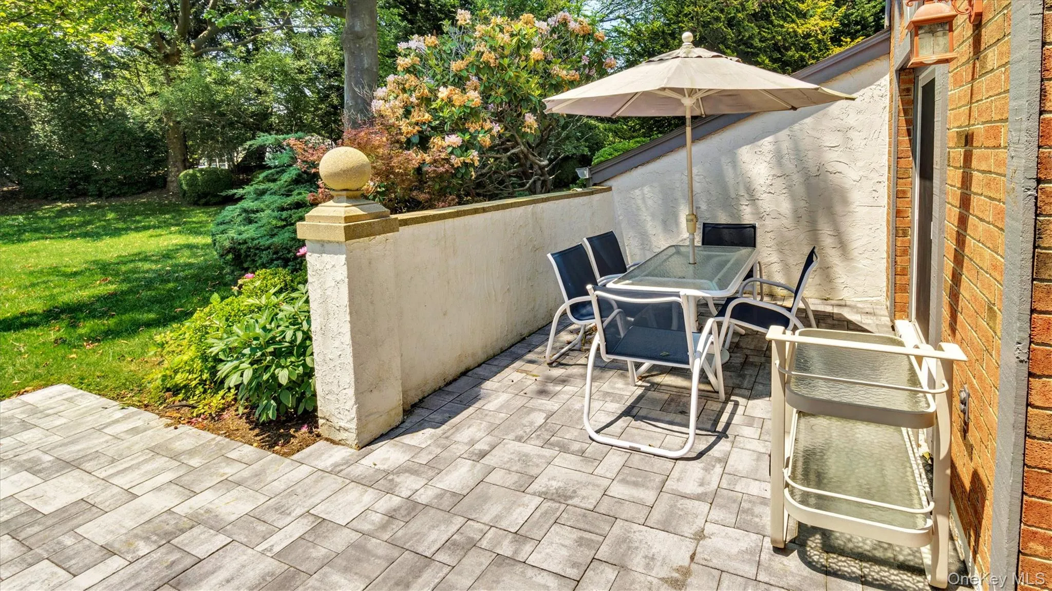 View of patio featuring outdoor dining area View of patio featuring outdoor dining area