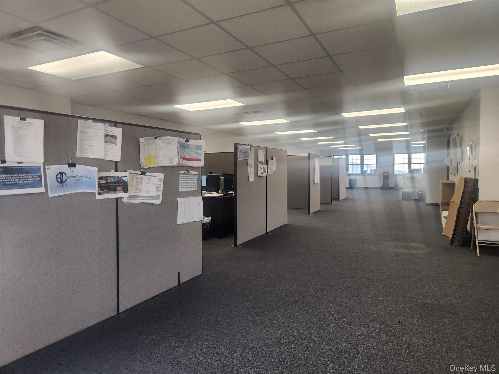 Office space with a drop ceiling Office space with a drop ceiling