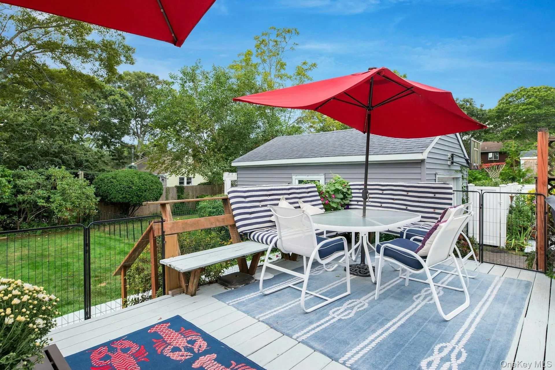 Wooden terrace with outdoor dining area Wooden terrace with outdoor dining area