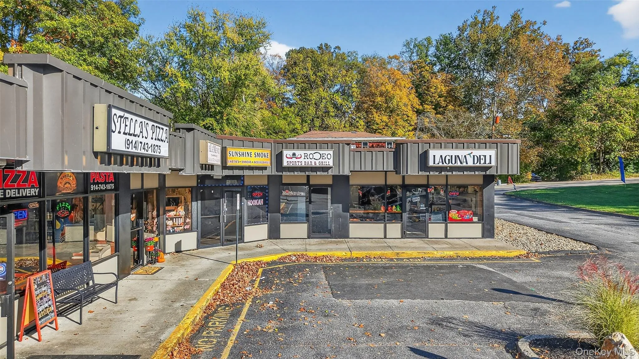 View of commercial location featuring uncovered parking View of commercial location featuring uncovered parking