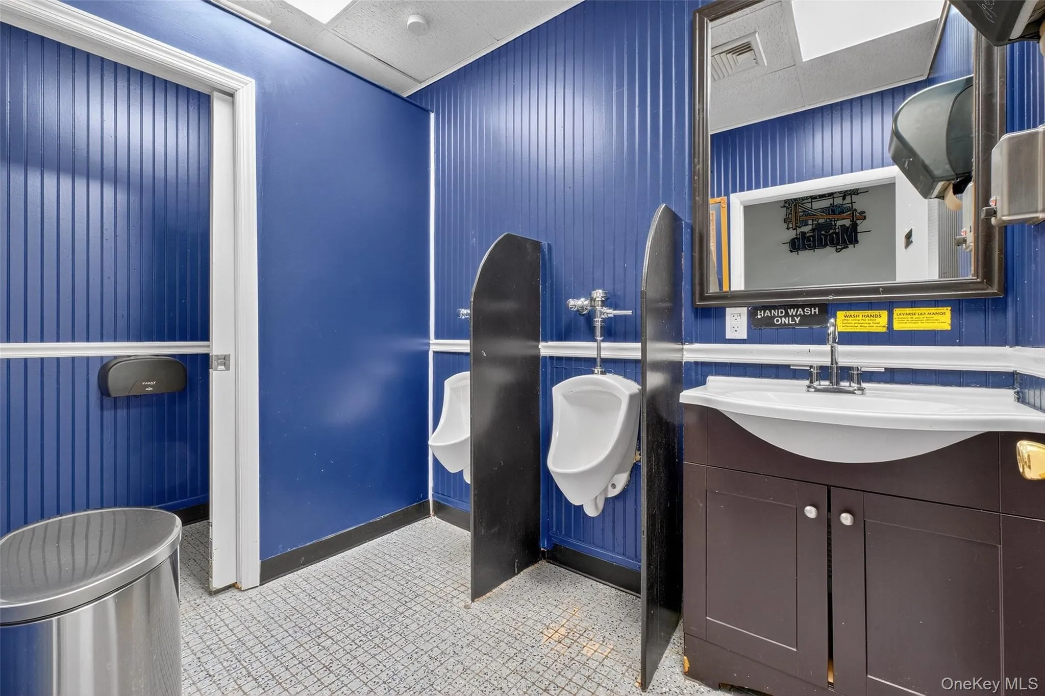 Bathroom featuring vanity and a paneled ceiling Bathroom featuring vanity and a paneled ceiling