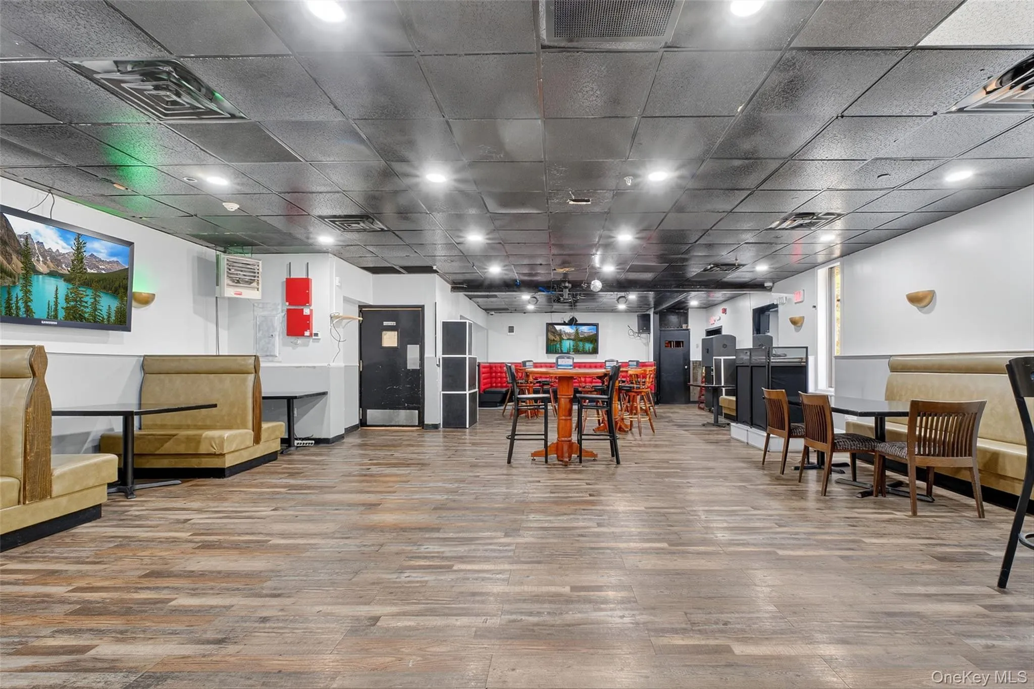 Dining room with wood finished floors Dining room with wood finished floors