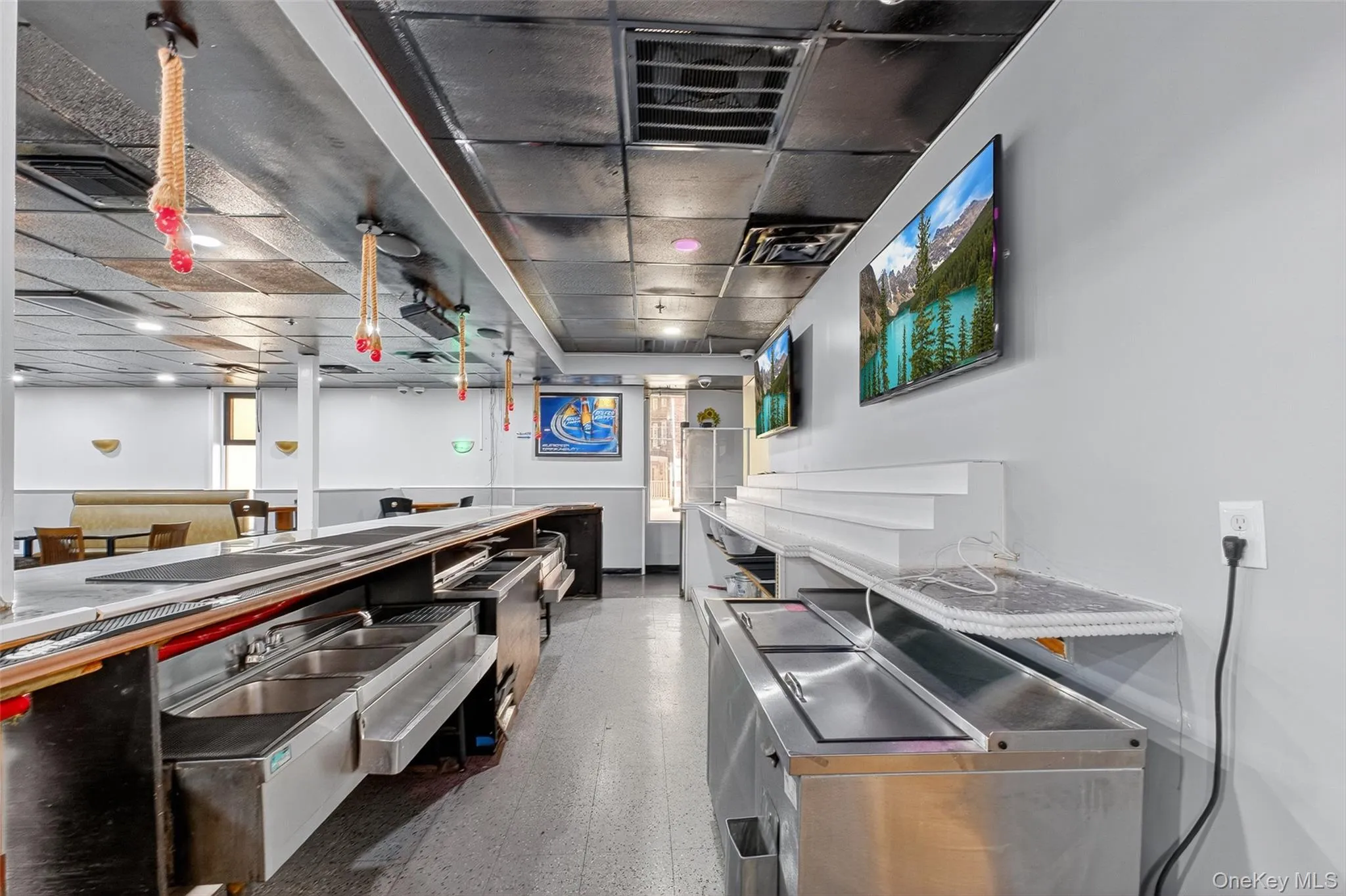 Kitchen featuring stainless steel countertops Kitchen featuring stainless steel countertops