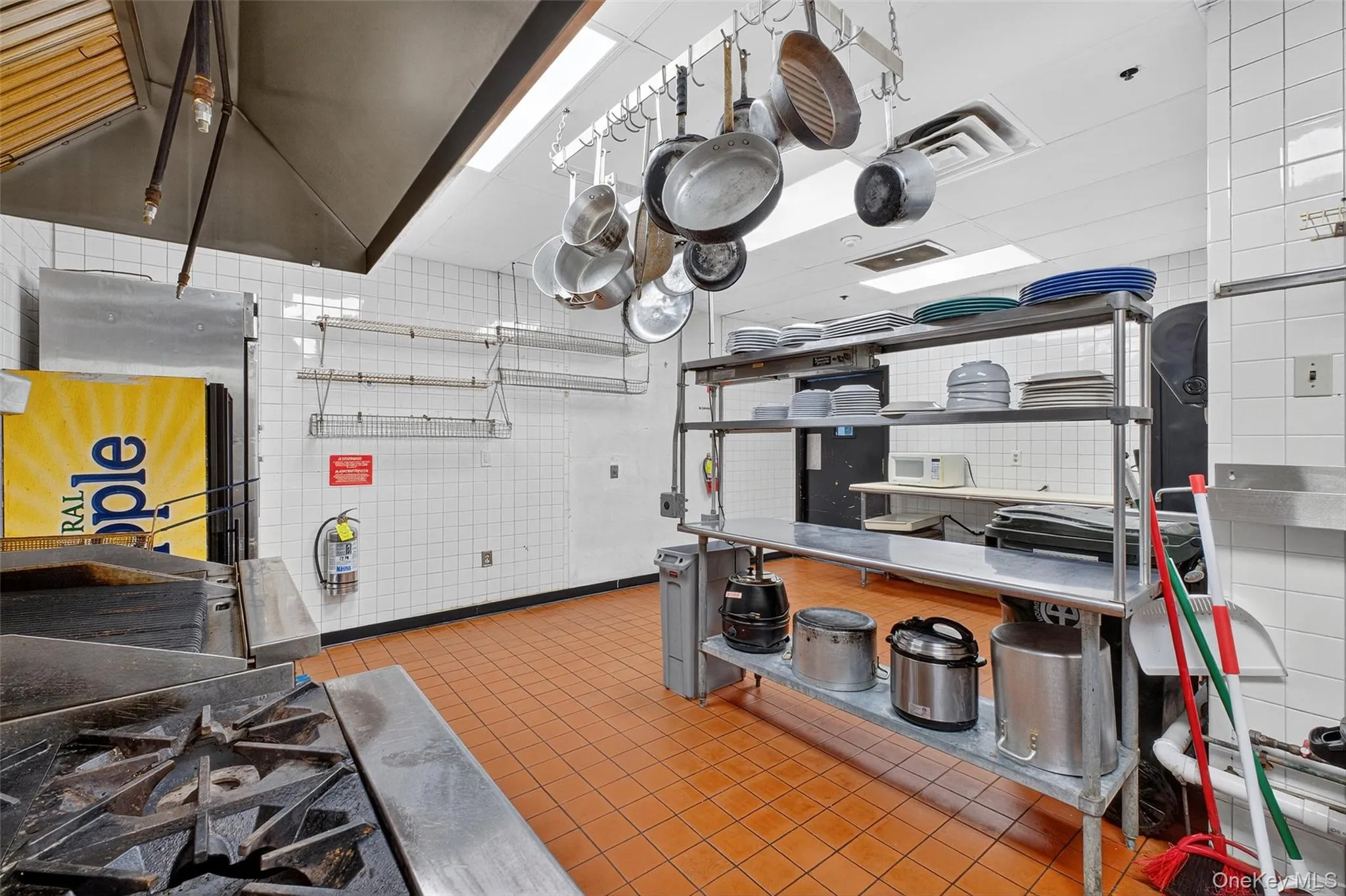 Kitchen with tile walls Kitchen with tile walls