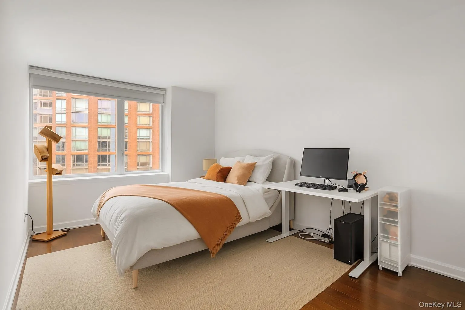 Bedroom featuring wood finished floors Bedroom featuring wood finished floors