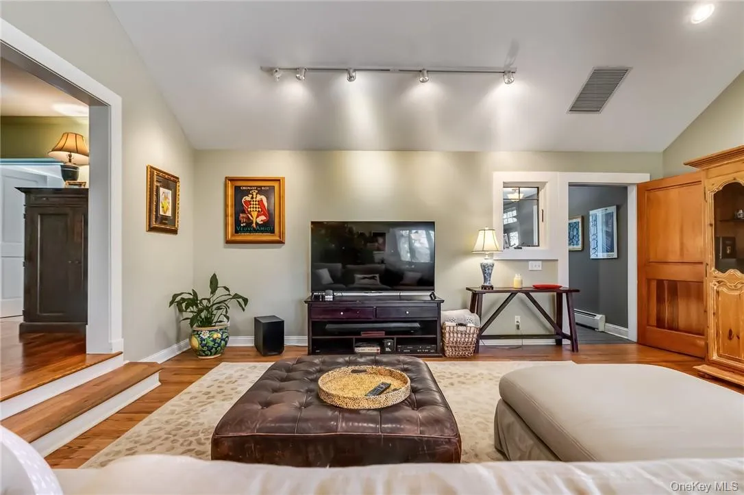 Great room featuring lofted ceiling Great room featuring lofted ceiling