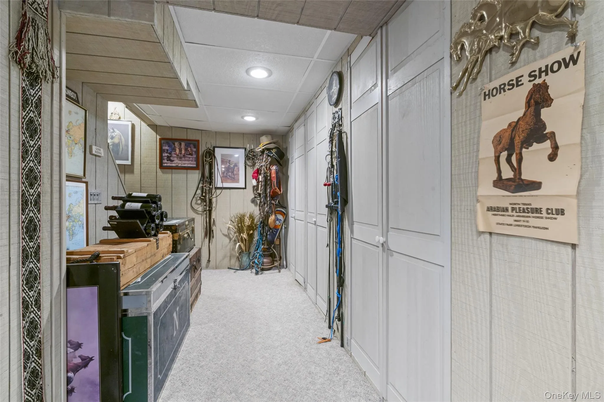 Hallway of basement with more closets Hallway of basement with more closets