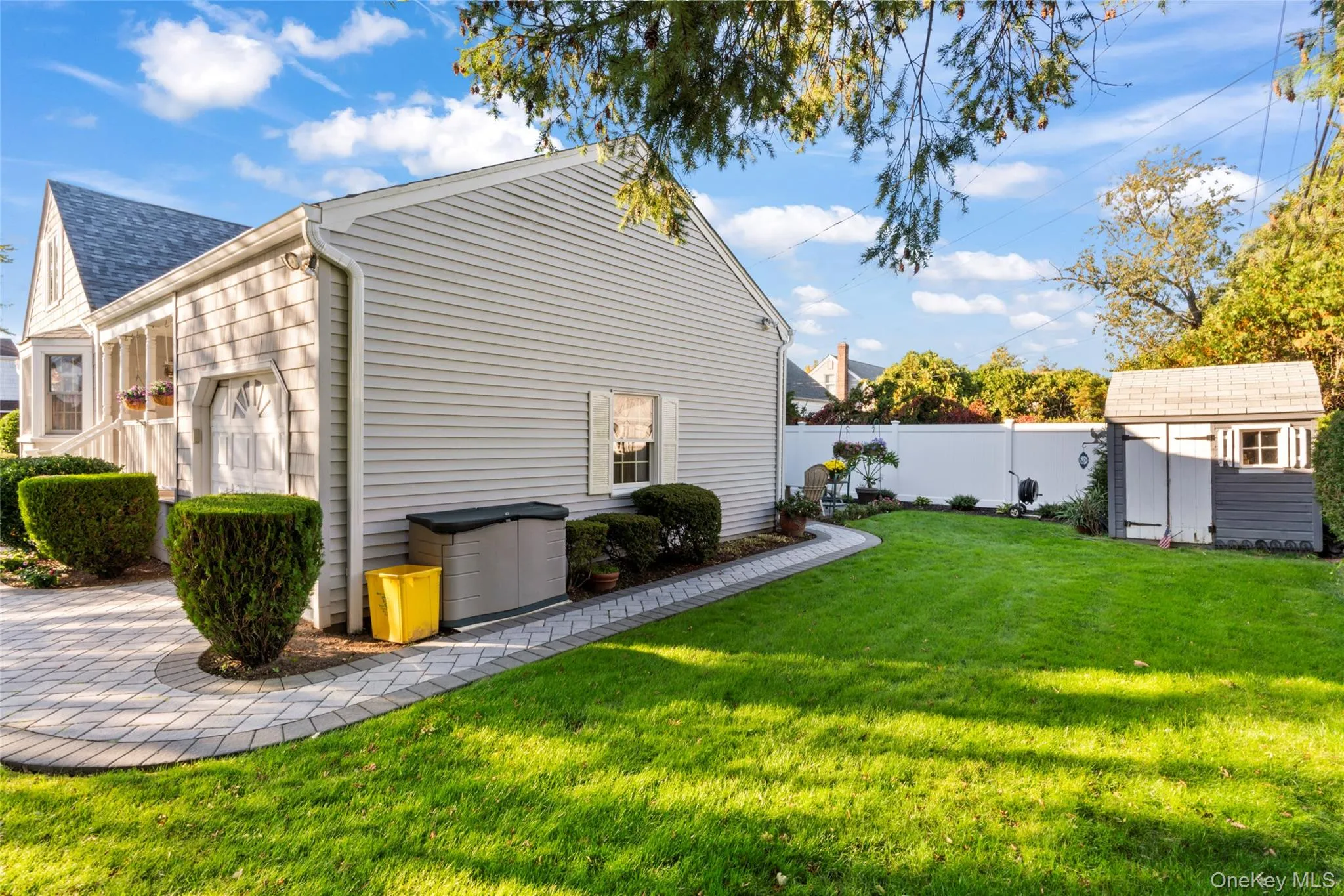 View of property exterior with a shed and a fenced backyard View of property exterior with a shed and a fenced backyard