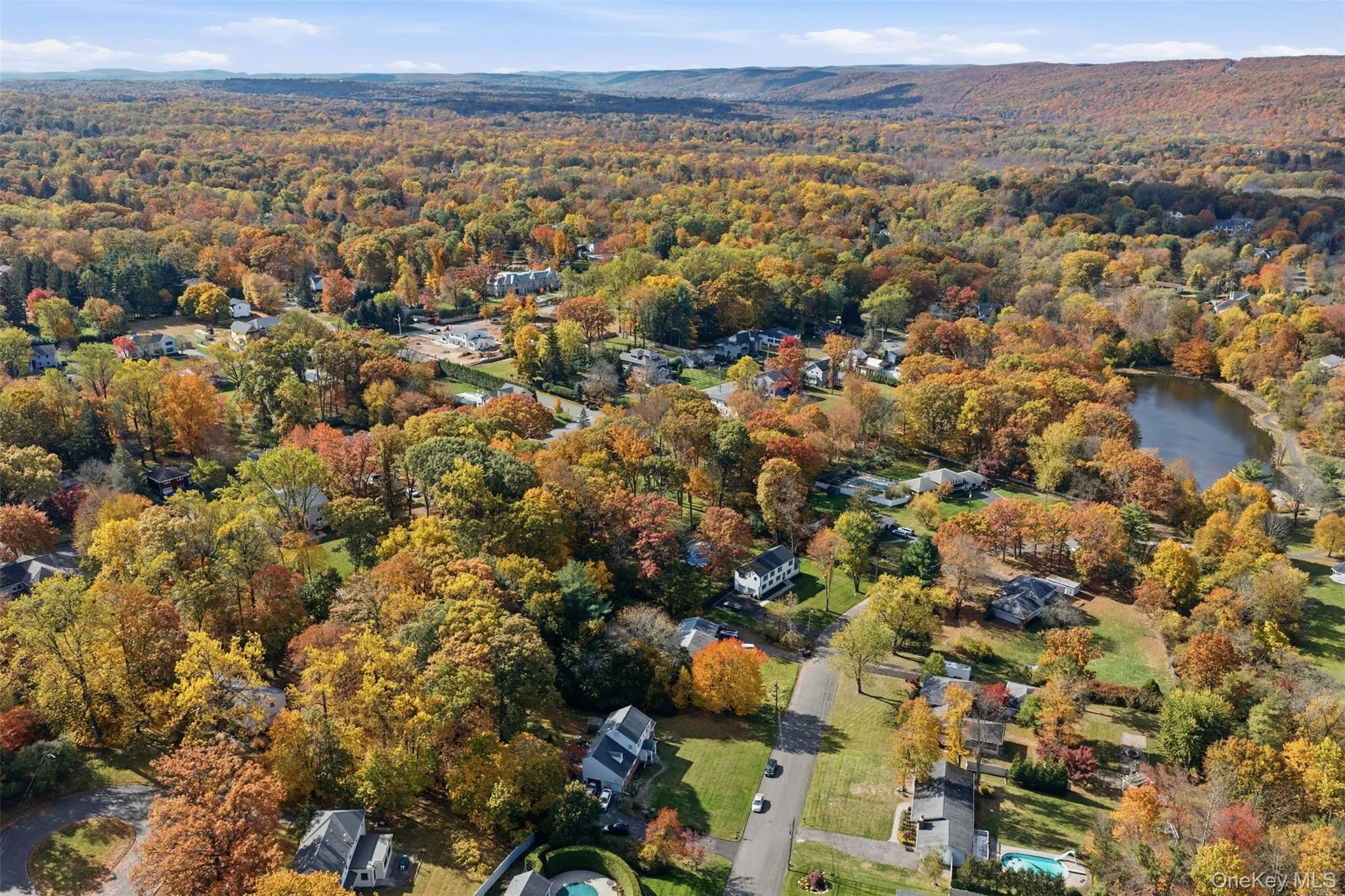 Aerial overview of property's location featuring a large body of water Aerial overview of property's location featuring a large body of water