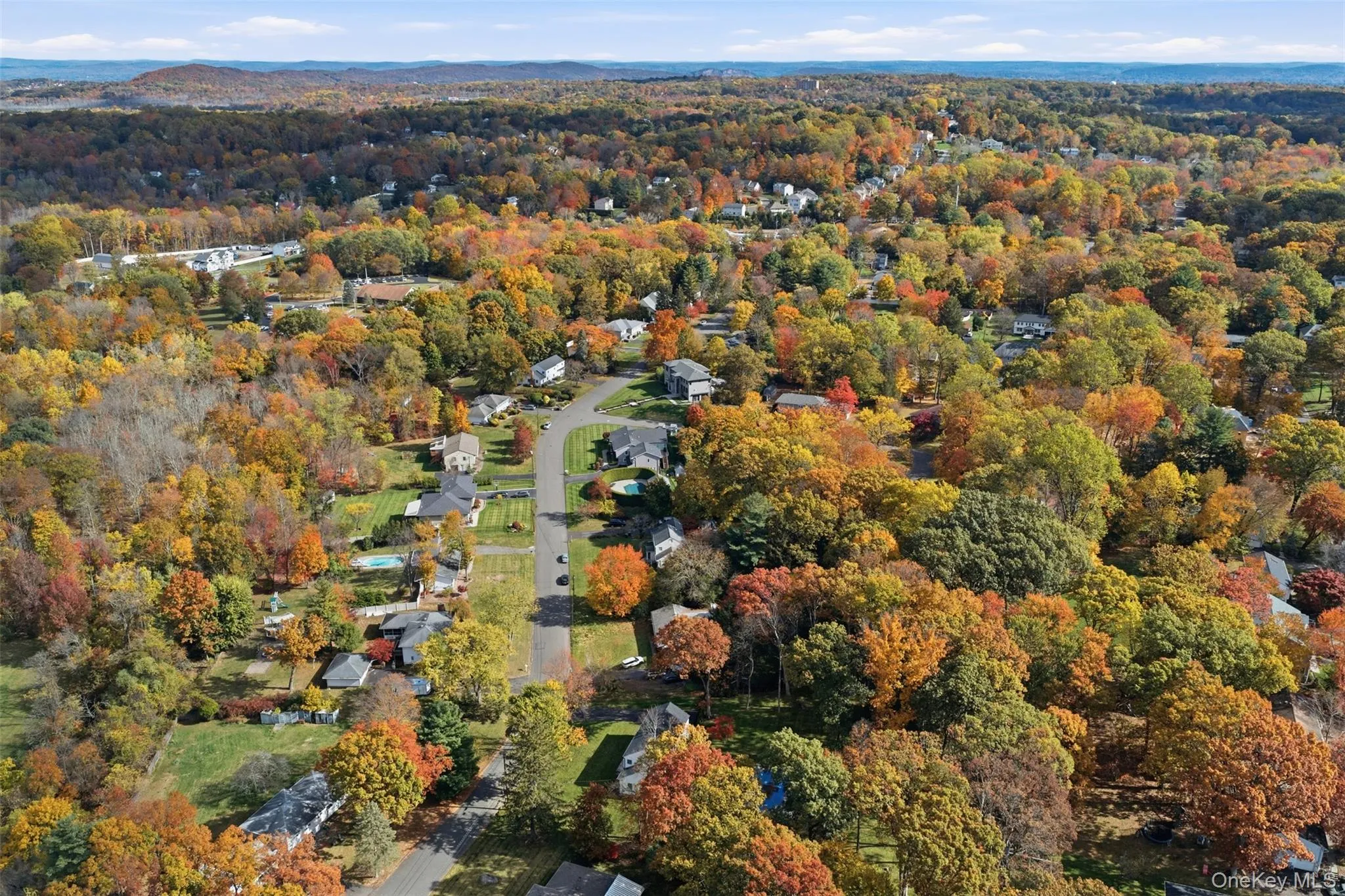 Aerial view of property's location featuring a forest Aerial view of property's location featuring a forest
