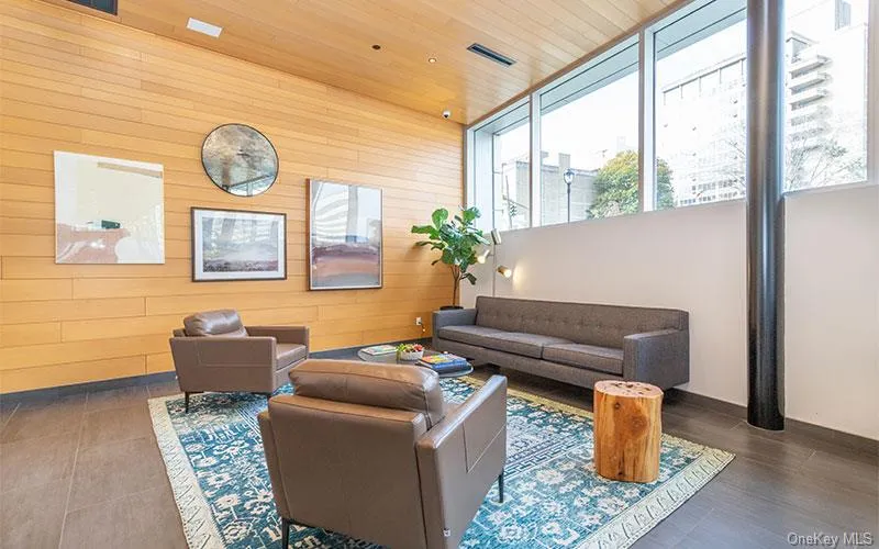 Building lobby with wood walls and wood ceiling Building lobby with wood walls and wood ceiling