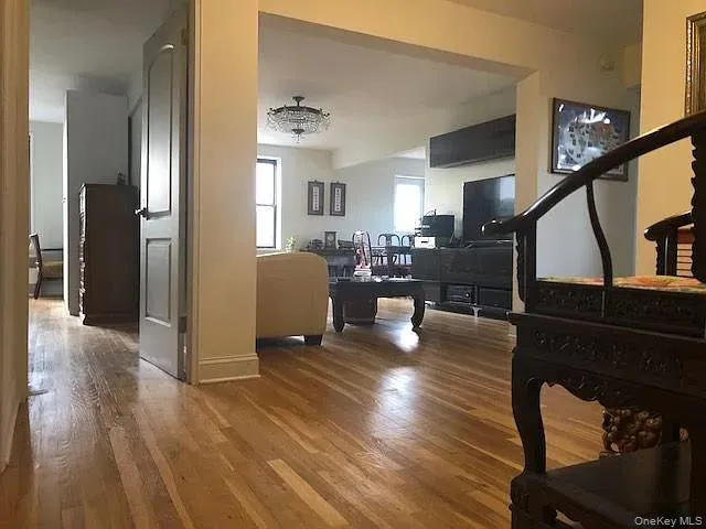 Living area featuring wood finished floors Living area featuring wood finished floors