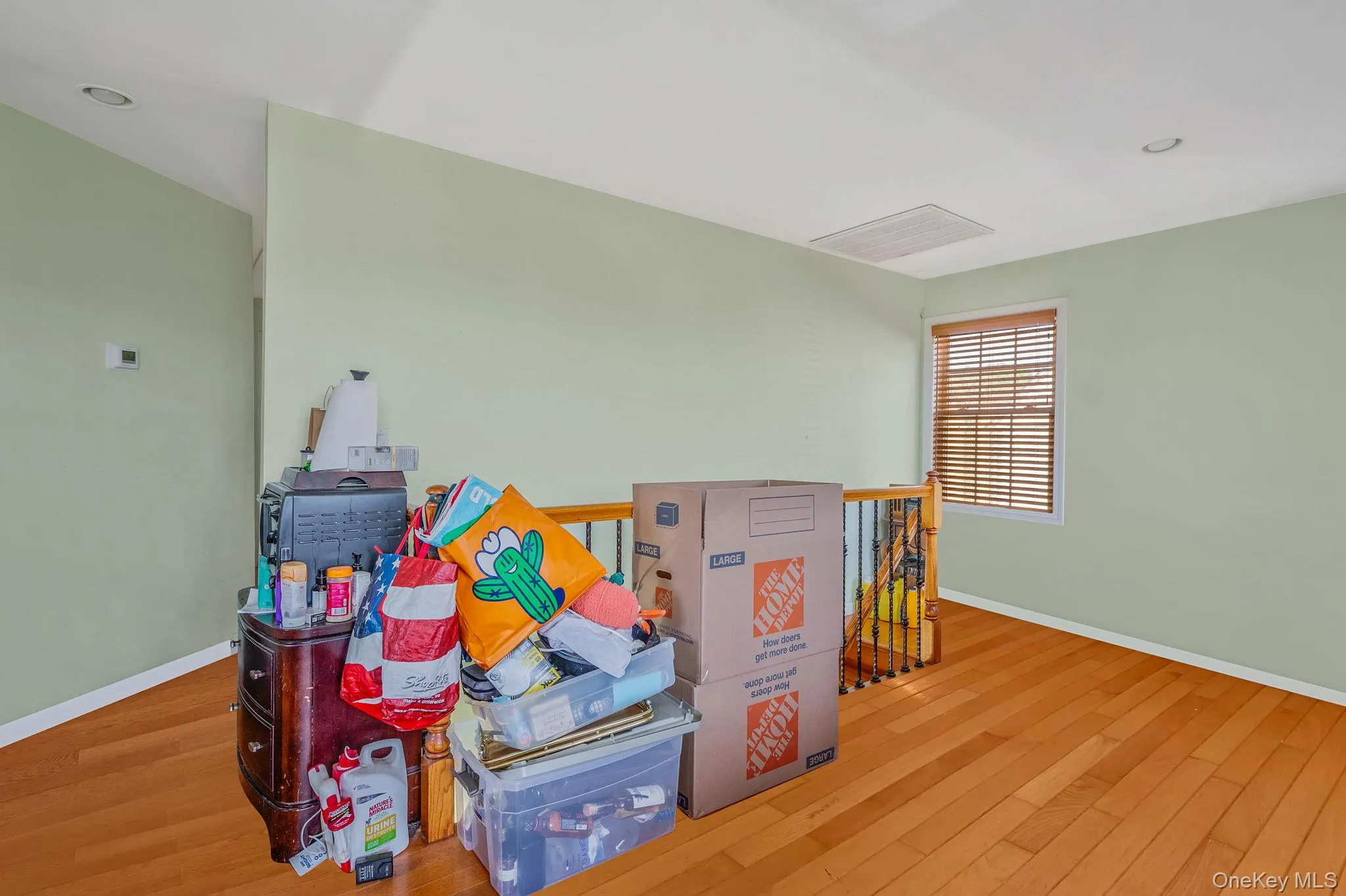 Rec room with wood finished floors and recessed lighting Rec room with wood finished floors and recessed lighting