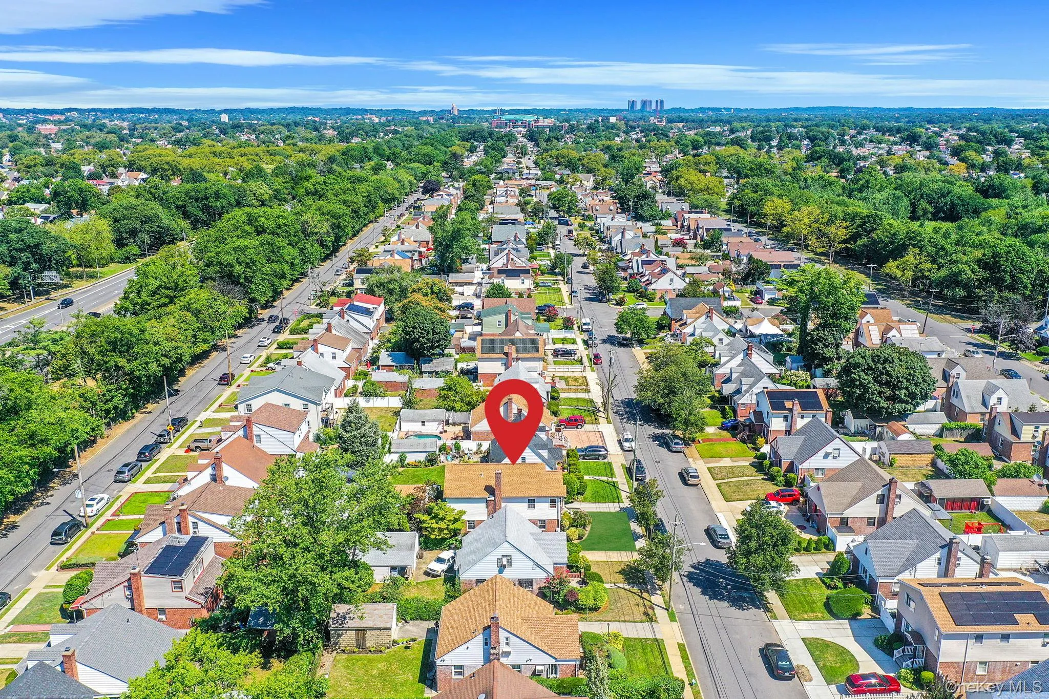 Aerial perspective of suburban area featuring a tree filled landscape Aerial perspective of suburban area featuring a tree filled landscape