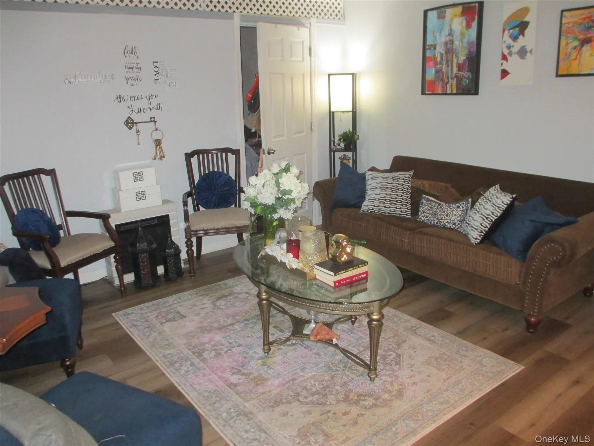 Living area featuring wood finished floors Living area featuring wood finished floors