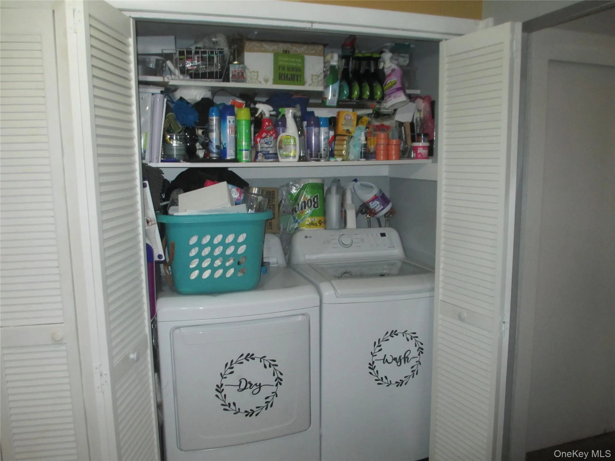 Laundry room featuring separate washer and dryer Laundry room featuring separate washer and dryer