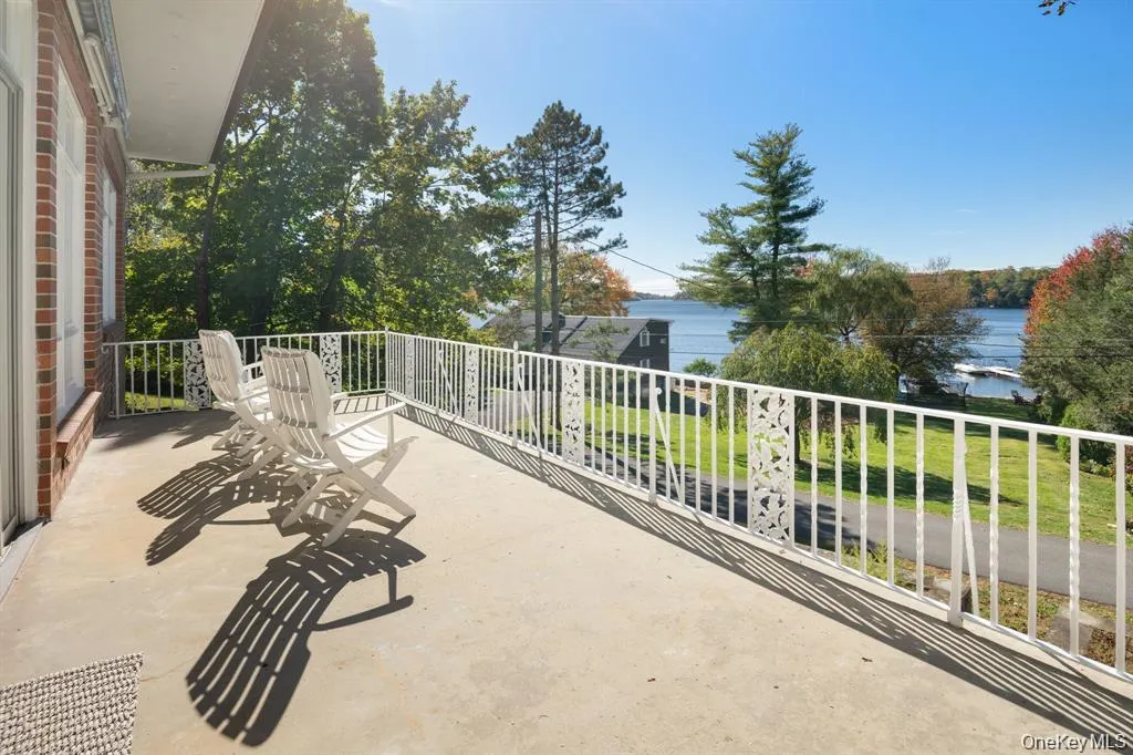 Balcony featuring a water view Balcony featuring a water view