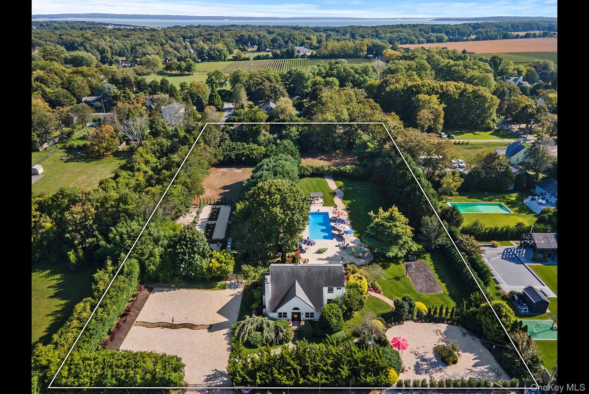 Aerial view of entire 2.4 acre property facing south Aerial view of entire 2.4 acre property facing south