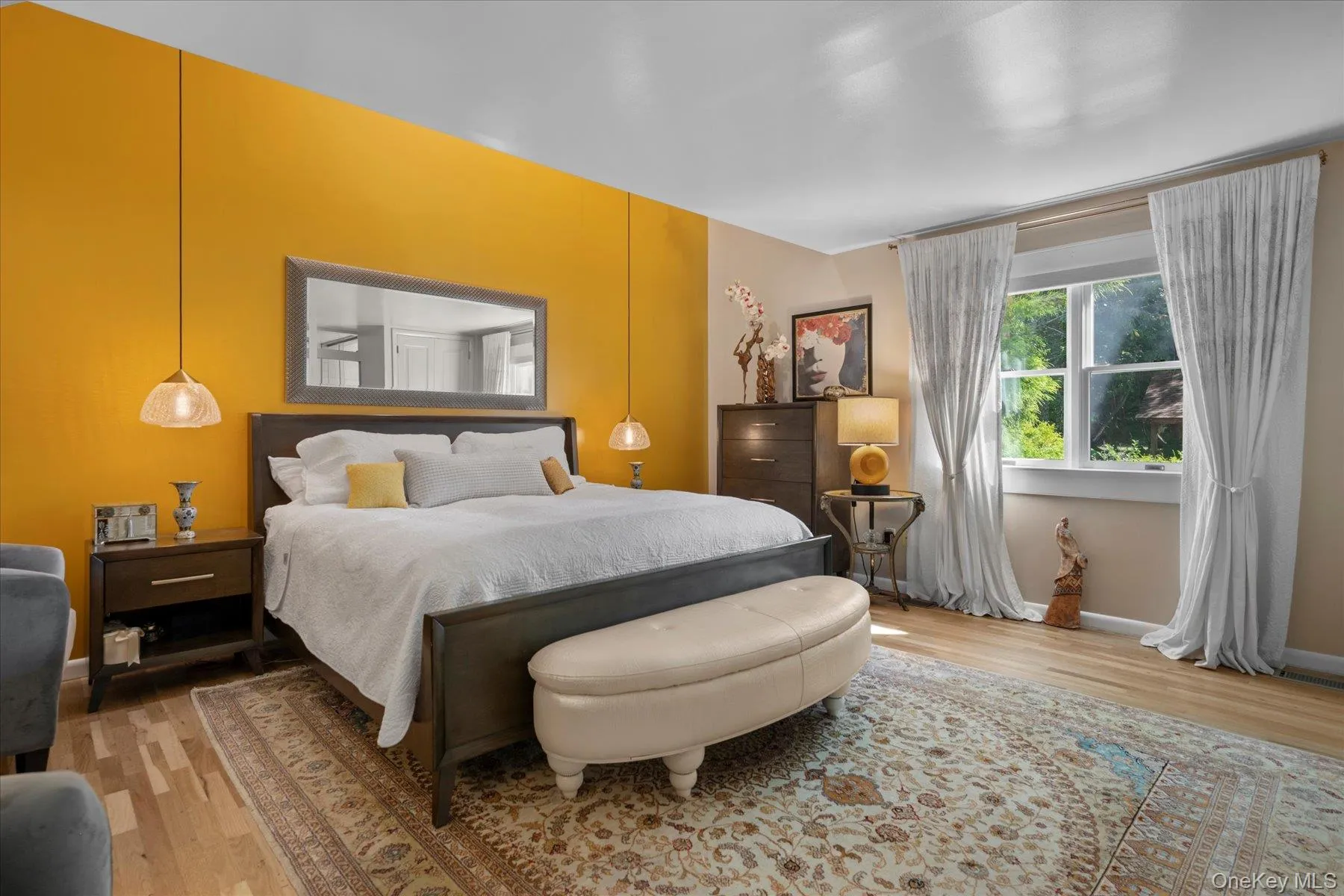 Bedroom with light wood-style flooring Bedroom with light wood-style flooring