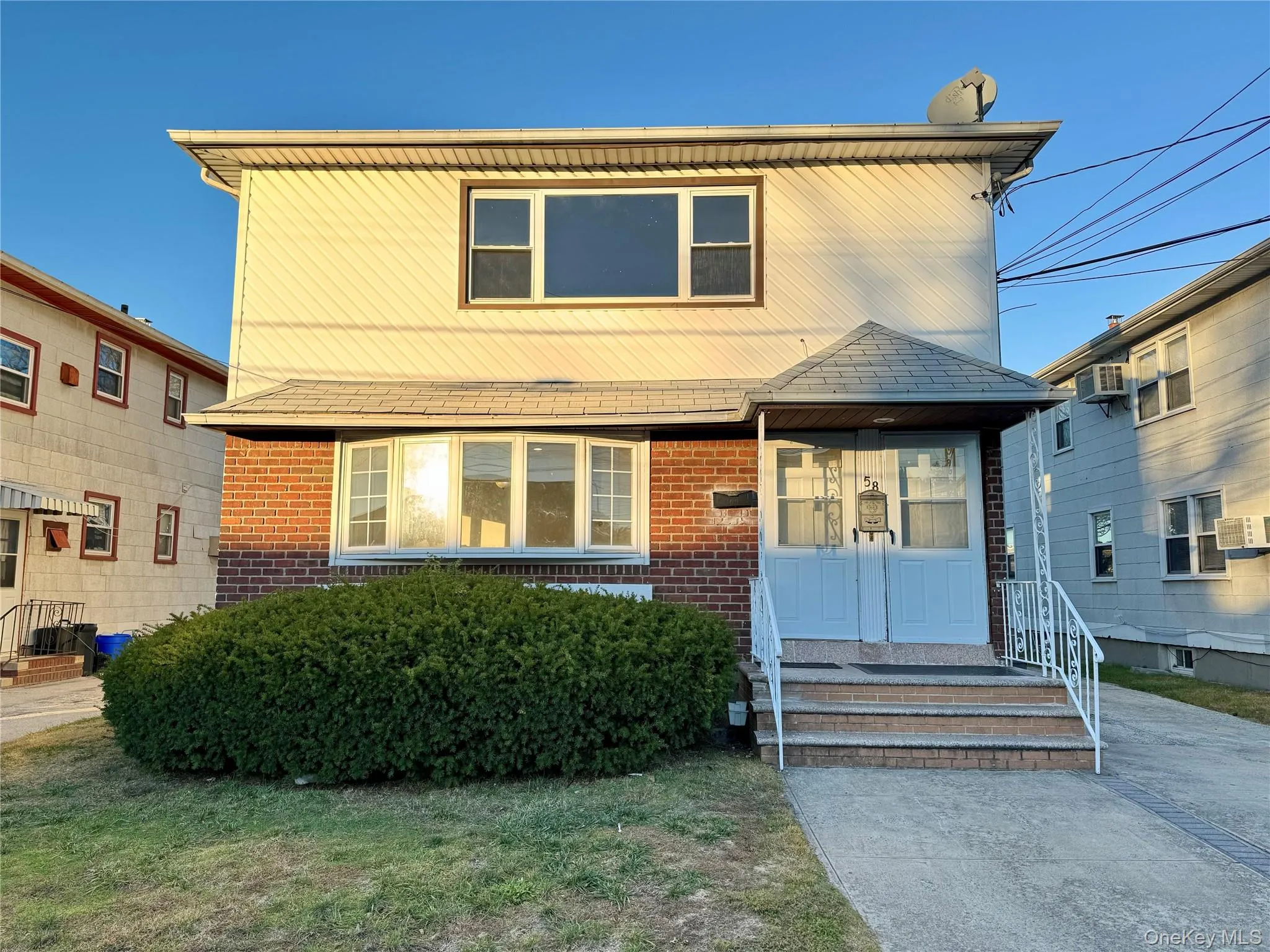 View of front of property with brick siding View of front of property with brick siding