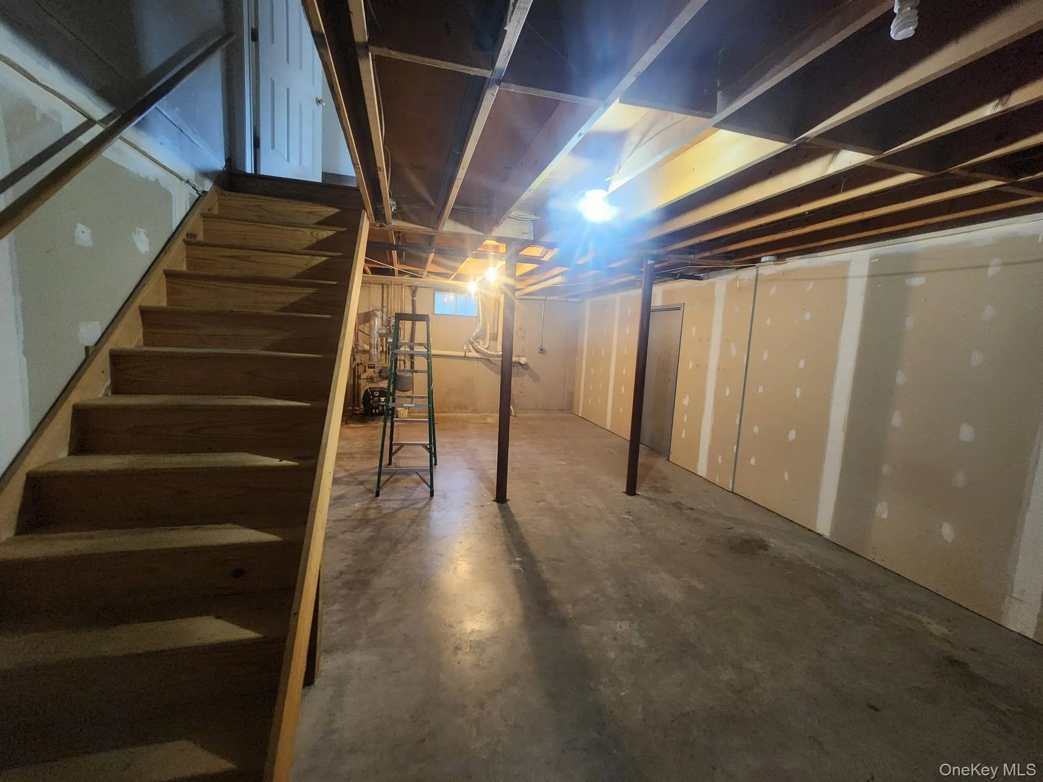 Unfinished basement featuring tons of storage space. Unfinished basement featuring tons of storage space.
