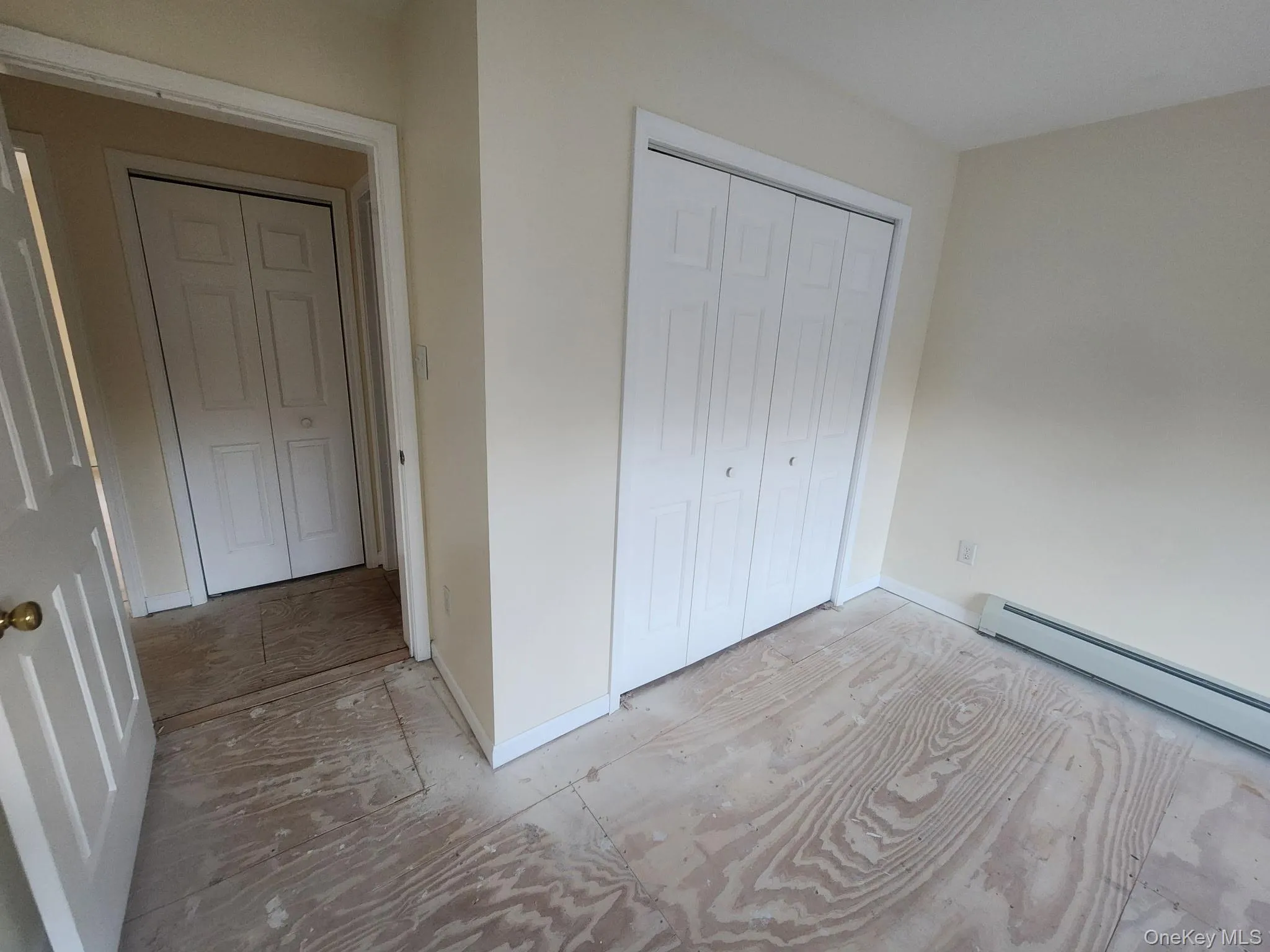 Unfurnished bedroom featuring baseboards and a closet. Unfurnished bedroom featuring baseboards and a closet.