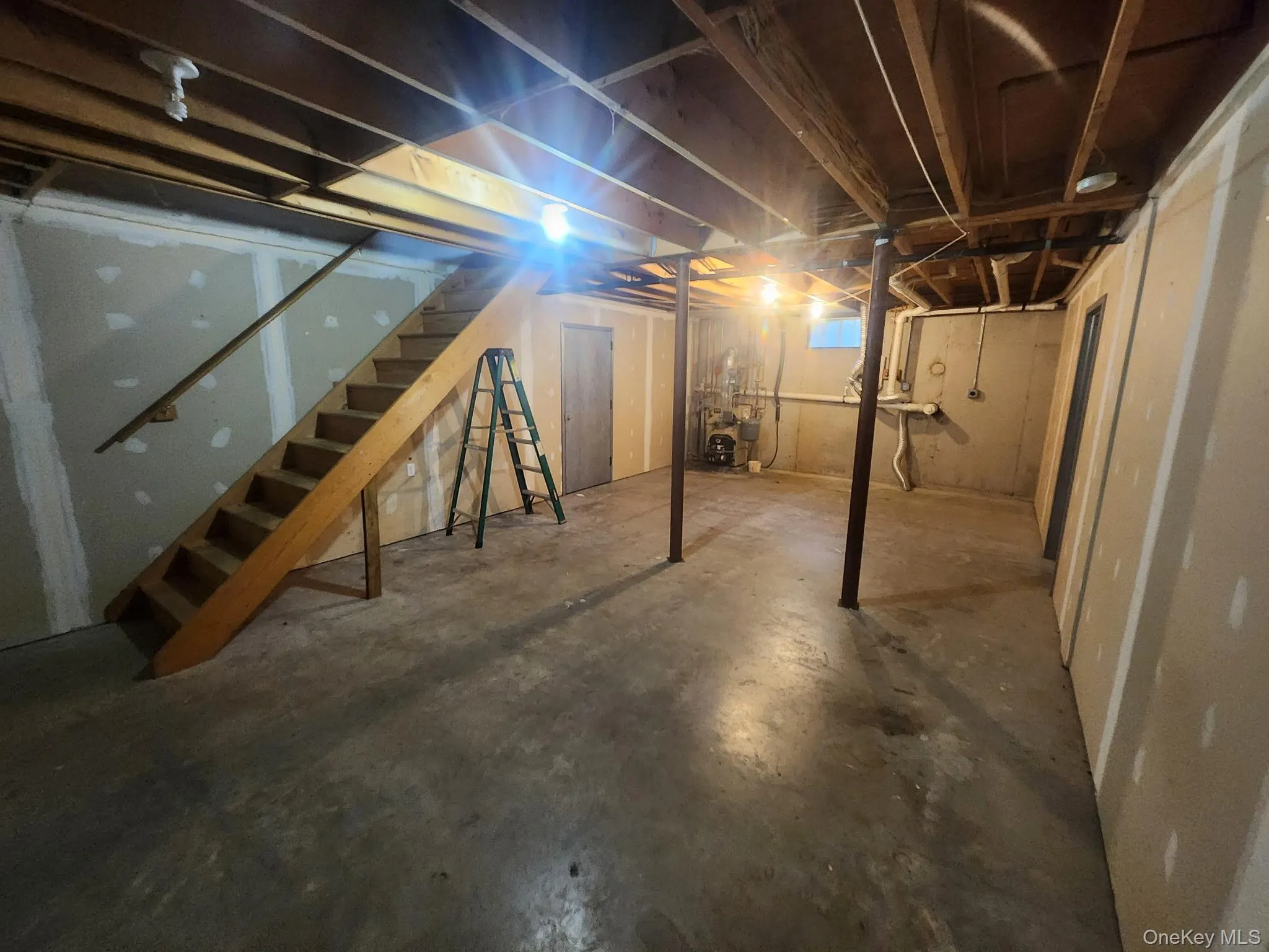 Unfinished basement with washer/dryer hookups. Unfinished basement with washer/dryer hookups.