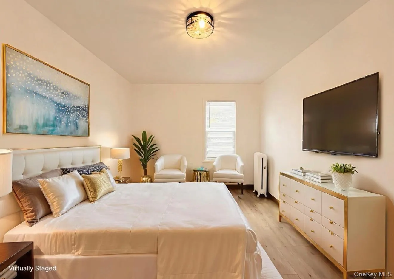 Bedroom with light wood-type flooring and radiator Bedroom with light wood-type flooring and radiator