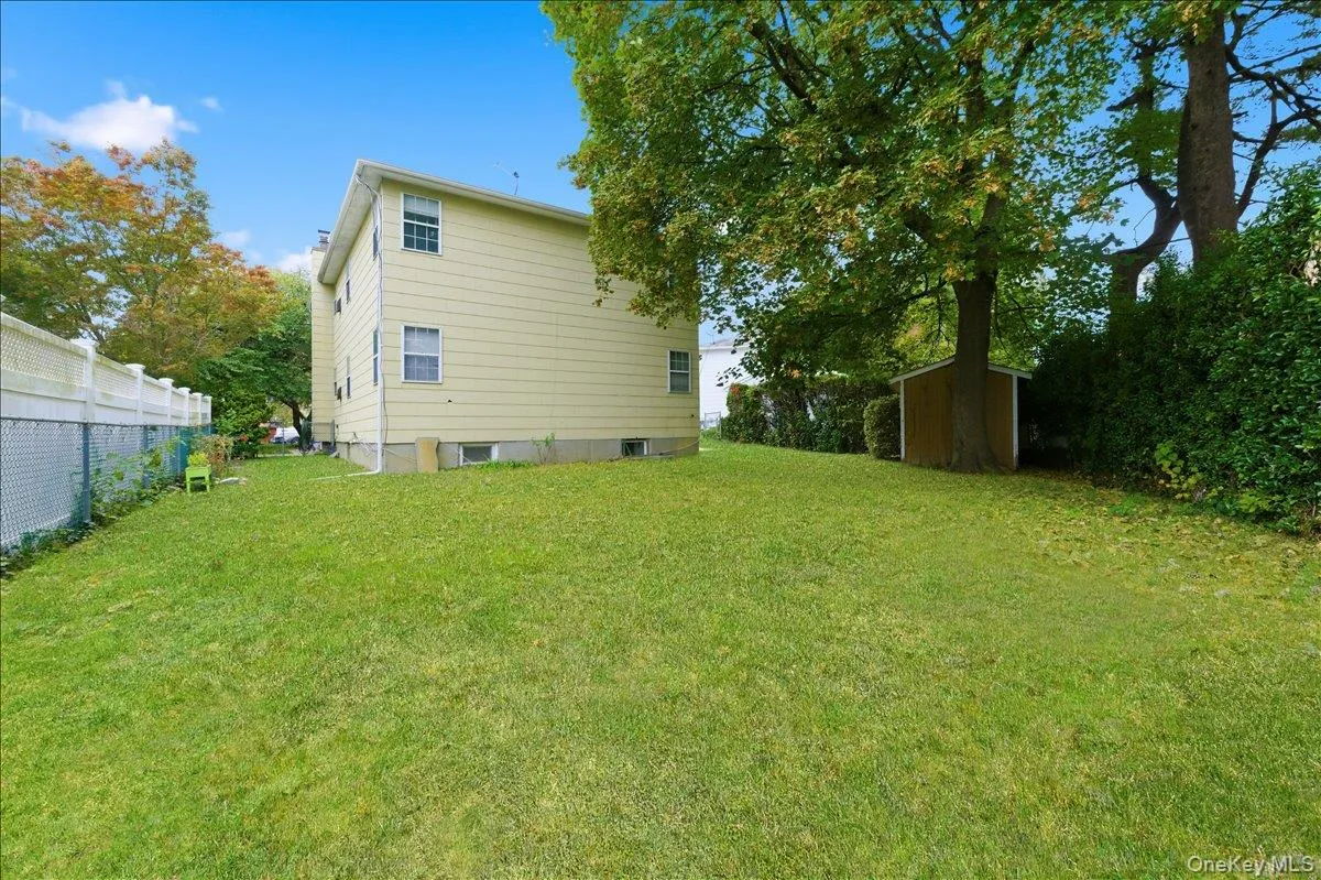 Rear view of house with a shed Rear view of house with a shed