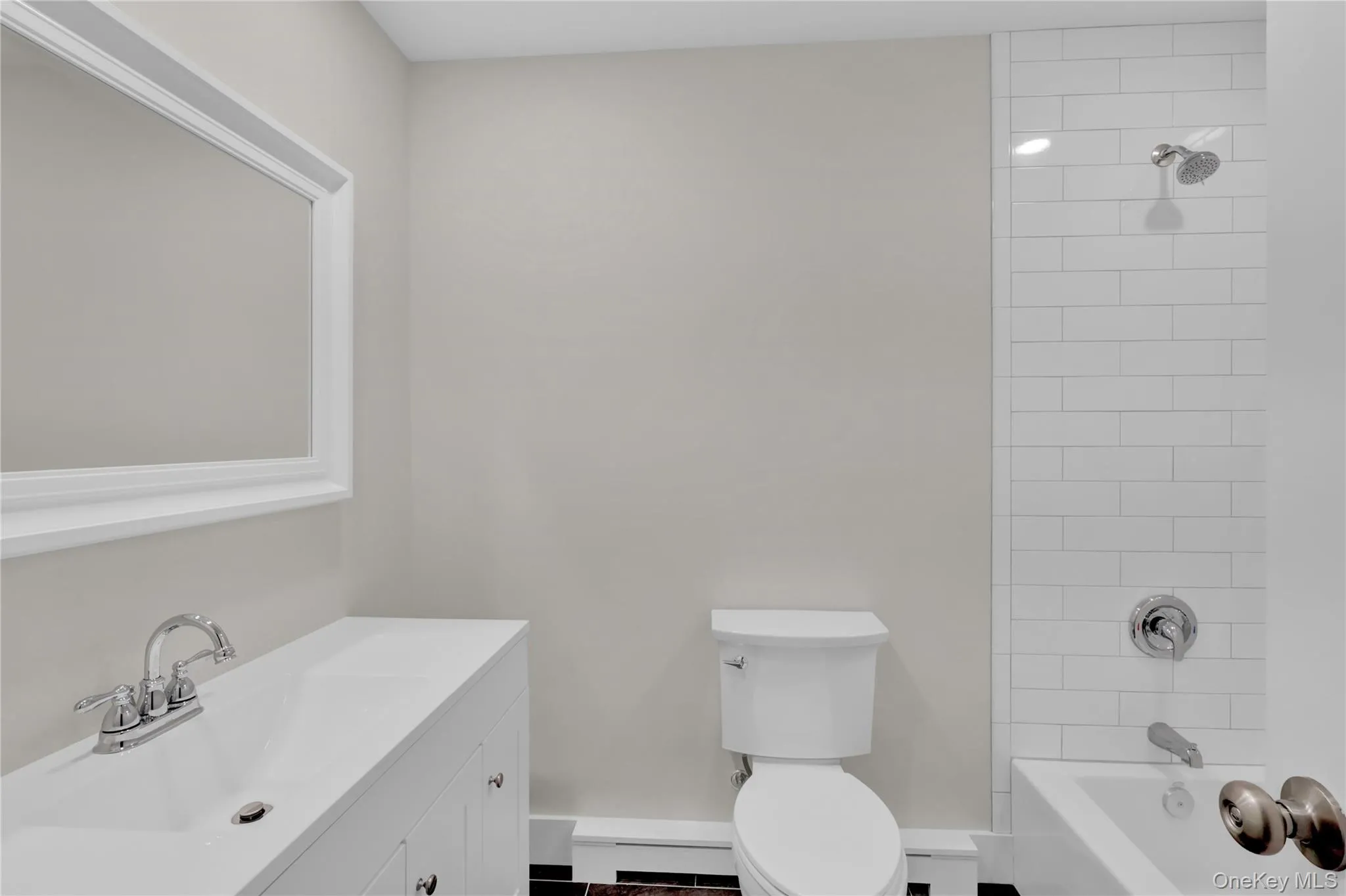 Full Hall bathroom with Vanity, tub / shower combination. Full Hall bathroom with Vanity, tub / shower combination.
