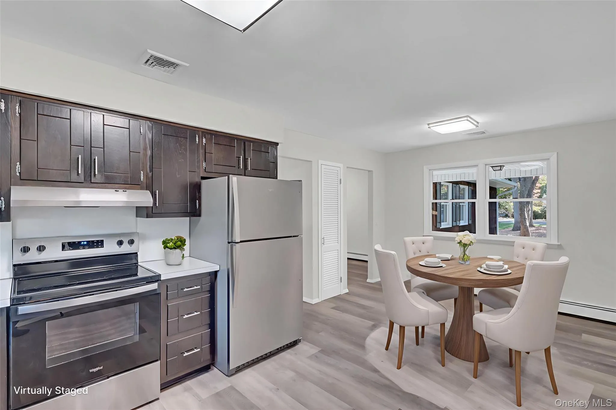 Eat-In Kitchen With New Stainless Appliances Eat-In Kitchen With New Stainless Appliances