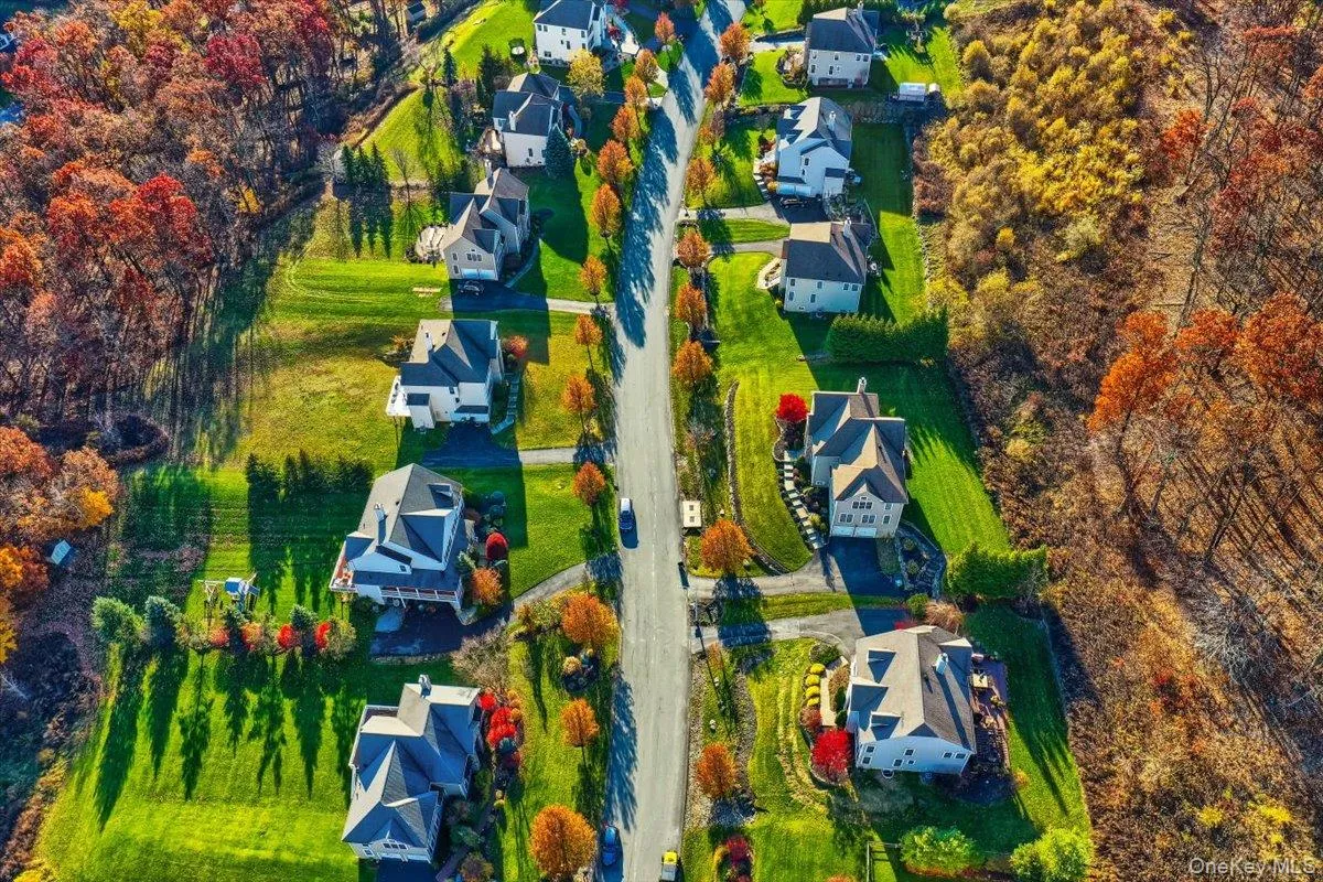 Aerial view of property's location with nearby suburban area Aerial view of property's location with nearby suburban area